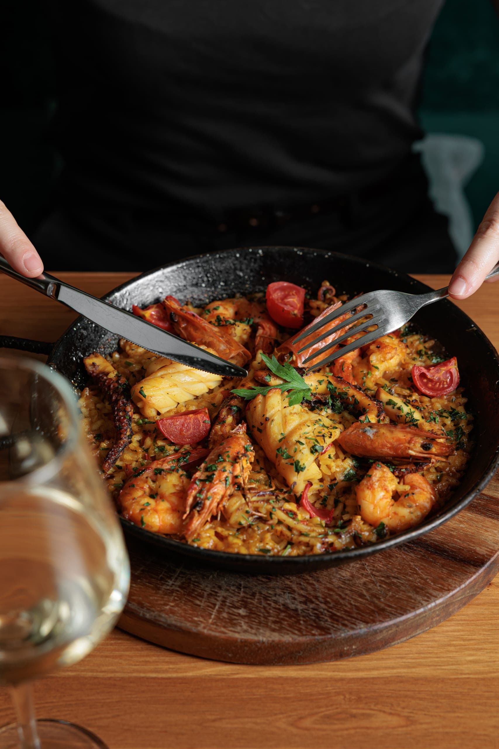 Seafood paella served tableside